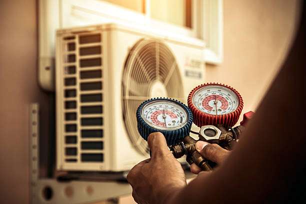 Professional Hvac technician working in Montville, OH